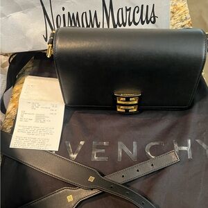 Givenchy Elegant Black Crossbody Bag with Gold Accents